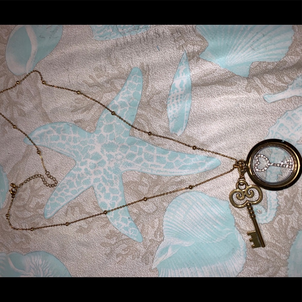 Origami Owl gold locket with key